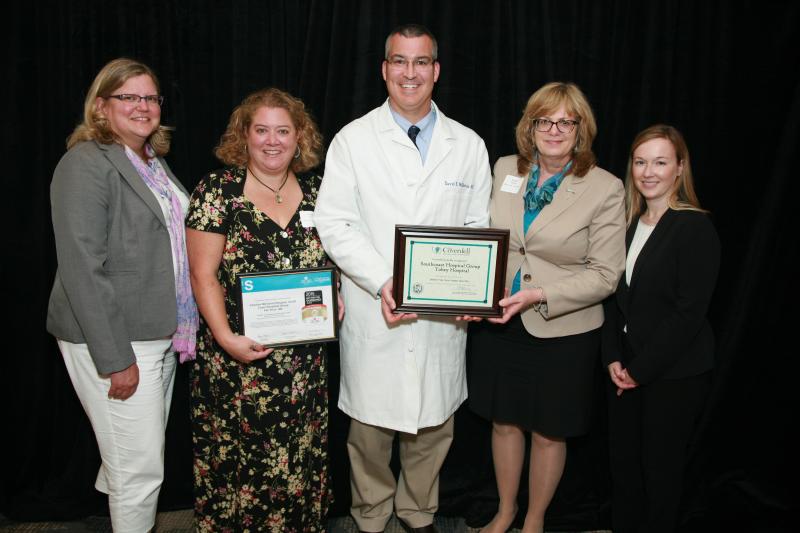 From left: Susan Ojamaa, Director of the Division of Prevention and Wellness for the Department of Public Health; Susan J. Pacheco, RN, BSN, Sr. Data Quality Analyst at Southcoast Health; David McGinnis, MD, Chairman of Tobey Hospital Emergency Department; Susan Mangini, RN, Associate Chief Nursing Officer at Tobey Hospital; Lisa Bemben, Senior Director of Quality & Systems Improvement for Massachusetts and Rhode Island at the American Heart Association/American Stroke Association BY SOUTHCOAST HEALTH